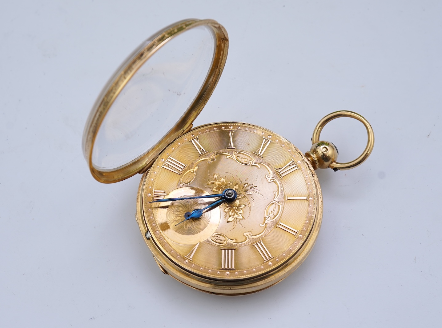 A Victorian engraved 18ct gold open faced key wind pocket watch